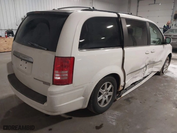 2010 Chrysler Town & Country Touring with VIN 2A4RR5D15AR114946, listed as a IAAI auction lot 42001471 with 222,299 mi miles. Bid and sale history available at carsss.com. Image 4.