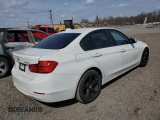 2013 BMW 3 Series 320i xDrive with VIN WBA3C3C5XDF980169, listed as a Copart auction lot 52717675 with 119,297 mi miles and Salvage title. Bid and sale history available at DreamBid. Image 3.