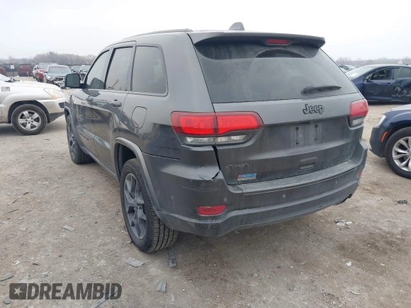 2021 Jeep Grand Cherokee 80th Anniversary z VIN 1C4RJFBGXMC621817, wystawiony jako IAAI lot #41519733 z przebiegiem 60 552 mil mil oraz . Historia ofert i sprzedaży dostępna na DreamBid. Obrazek 6.