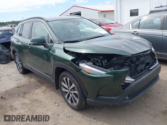2023 Toyota Corolla Cross XLE with VIN 7MUEAAAG9PV053569, listed as a IAAI auction lot 42319709 with 71,105 mi miles and . Bid and sale history available at DreamBid. Image 1.