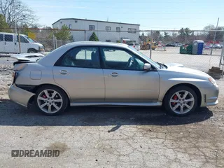 2007 Subaru Impreza WRX z VIN JF1GD74617H506965, wystawiony jako IAAI lot #41942978 z przebiegiem 108 935 mil mil oraz . Historia ofert i sprzedaży dostępna na DreamBid. Obrazek 12.