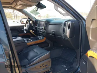 2018 Chevrolet Silverado 1500 High Country with VIN 3GCUKTEC8JG308353, listed as a IAAI auction lot 40714183 with 88,711 mi miles and . Bid and sale history available at DreamBid. Image 5.