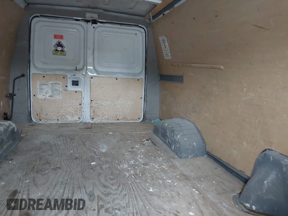 2007 Ford Econoline Cargo Commercial with VIN 1FTNE24W77DB00407, listed as a IAAI auction lot 42330484 with 128,369 mi miles and . Bid and sale history available at DreamBid. Image 8.