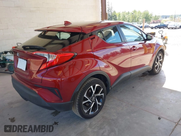 2018 Toyota C-HR XLE with VIN NMTKHMBX6JR027381, listed as a IAAI auction lot 42149905 with 118,897 mi miles and . Bid and sale history available at DreamBid. Image 4.