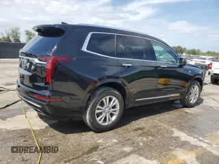 2023 Cadillac XT6 FWD Luxury z VIN 1GYKPAR45PZ187400, wystawiony jako Copart lot #54562335 z przebiegiem 16 953 mil mil oraz Szkoda całkowita • Salvage title. Historia ofert i sprzedaży dostępna na DreamBid. Obrazek 3.