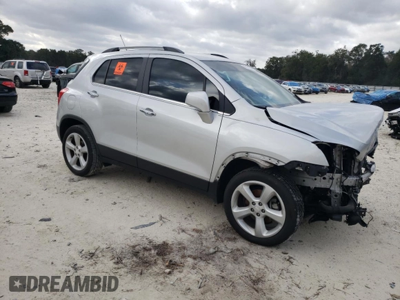 2016 Chevrolet Trax LTZ with VIN 3GNCJRSB5GL255423, listed as a Copart auction lot 86134524 with 61,776 mi miles and Salvage Title. Bid and sale history available at carsss.com. Image 4.