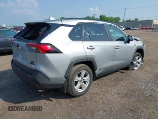 2020 Toyota RAV4 Hybrid XLE z VIN 2T3RWRFVXLW054810, wystawiony jako IAAI lot #42411211 z przebiegiem 94 523 mil mil oraz . Historia ofert i sprzedaży dostępna na DreamBid. Obrazek 4.
