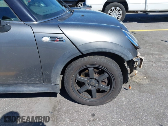 2005 MINI Convertible S with VIN WMWRH33545TF85051, listed as a IAAI auction lot 41843147 with 109,656 mi miles and . Bid and sale history available at DreamBid. Image 16.