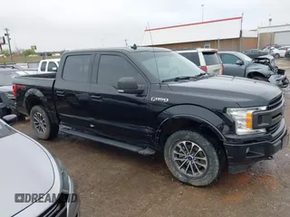 2019 Ford F-150 XL with VIN 1FTEW1EP7KKF18114, listed as a IAAI auction lot 41957860 with 106,017 mi miles and . Bid and sale history available at DreamBid. Image 14.