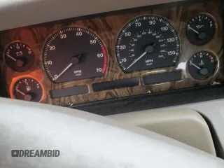 1995 Jaguar XJ with VIN SAJHX174XSC738856, listed as a Copart auction lot 57768915 with Not provided miles and Salvage title. Bid and sale history available at DreamBid. Image 9.