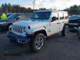 2020 Jeep Wrangler Unlimited Sahara with VIN 1C4HJXENXLW220910, listed as a IAAI auction lot 41090420 with 88,895 mi miles and . Bid and sale history available at DreamBid. Image 18.