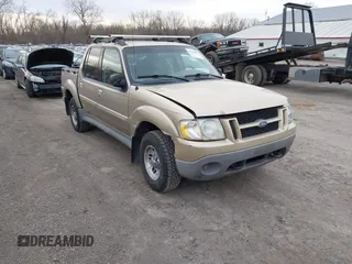 2001 Ford Explorer Sport Trac z VIN 1FMZU77E71UB38985, wystawiony jako IAAI lot #41950927 z przebiegiem 283 235 mil mil oraz . Historia ofert i sprzedaży dostępna na DreamBid. Obrazek 1.