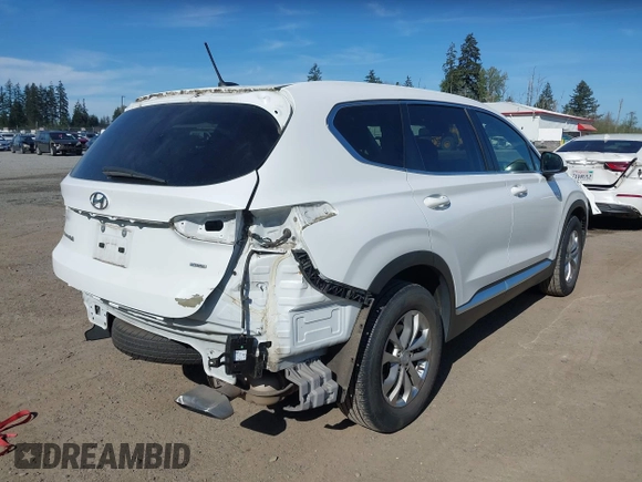 2019 Hyundai Santa Fe SE with VIN 5NMS2CAD0KH098259, listed as a IAAI auction lot 42075356 with 55,163 mi miles and . Bid and sale history available at DreamBid. Image 4.