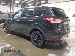 2015 Ford Escape SE with VIN 1FMCU9G91FUC49902, listed as a IAAI auction lot 41947883 with 140,670 mi miles. Bid and sale history available at carsss.com. Image 3.
