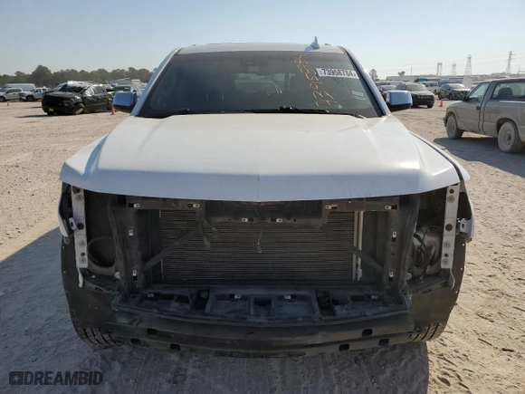 2017 Chevrolet Suburban Premier with VIN 1GNSCJKC7HR128988, listed as a Copart auction lot 73958784 with 121,662 mi miles and Salvage Title. Bid and sale history available at carsss.com. Image 5.