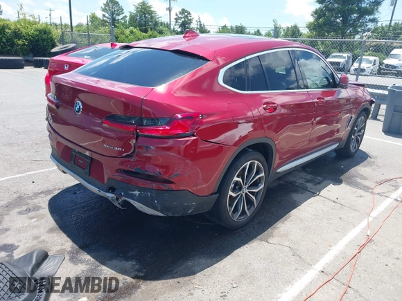 2021 BMW X4 xDrive30i with VIN 5UX2V1C07M9F59530, listed as a IAAI auction lot 42484957 with Not provided miles and . Bid and sale history available at DreamBid. Image 4.