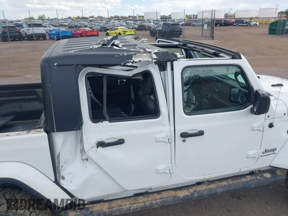 2021 Jeep Gladiator High Altitude with VIN 1C6HJTFG2ML567988, listed as a IAAI auction lot 42103576 with 74,849 mi miles and . Bid and sale history available at DreamBid. Image 6.