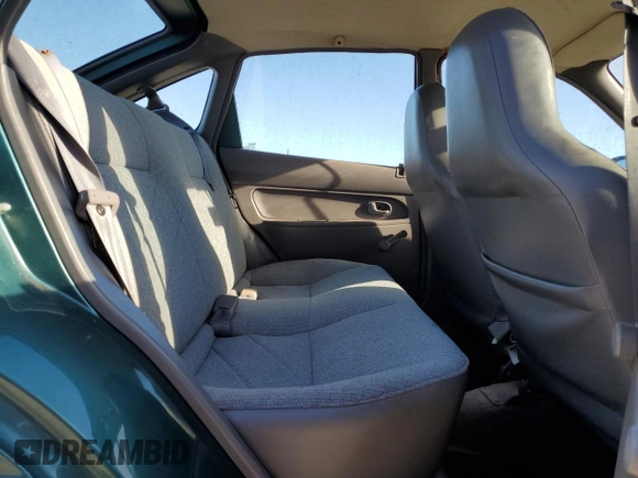 1996 Ford Aspire z VIN KNJLT06H0T6195551, wystawiony jako Copart lot #79450694 z przebiegiem 887 992 mil mil oraz Czysty tytuł • Clean title. Historia ofert i sprzedaży dostępna na DreamBid. Obrazek 10.