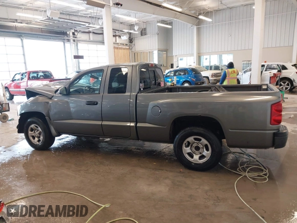 2005 Dodge Dakota ST with VIN 1D7HE22KX5S108948, listed as a IAAI auction lot 41588626 with 149,594 mi miles and . Bid and sale history available at DreamBid. Image 13.