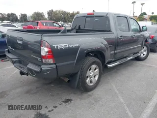2014 Toyota Tacoma PreRunner with VIN 3TMKU4HN9EM041509, listed as a IAAI auction lot 42441194 with 290,715 mi miles and . Bid and sale history available at DreamBid. Image 4.