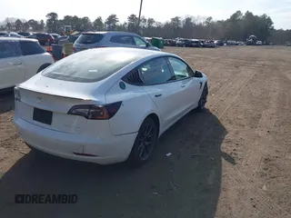 2021 Tesla Model 3 Long Range with VIN 5YJ3E1EB2MF858267, listed as a IAAI auction lot 41782360 with 79,671 mi miles and . Bid and sale history available at DreamBid. Image 4.