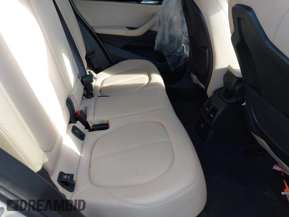2018 BMW X1 xDrive28i with VIN WBXHT3C34J5L29714, listed as a IAAI auction lot 41825126 with 89,970 mi miles. Bid and sale history available at carsss.com. Image 8.