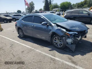 2014 Toyota Corolla L with VIN 5YFBURHE5EP014071, listed as a Copart auction lot 61442695 with 140,944 mi miles and Salvage title. Bid and sale history available at DreamBid. Image 4.