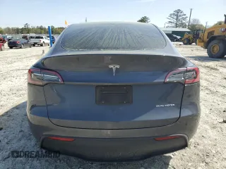 2023 Tesla Model Y Long Range z VIN 7SAYGAEE9PF662103, wystawiony jako Copart lot #51332105 z przebiegiem 35 294 mil mil oraz Szkody całkowita. Historia ofert i sprzedaży dostępna na DreamBid. Obrazek 6.