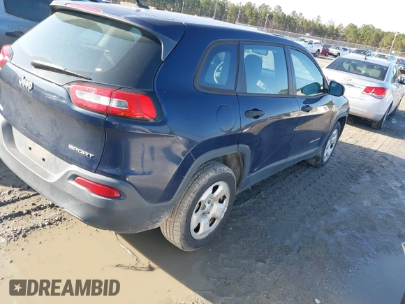2015 Jeep Cherokee Sport with VIN 1C4PJLAB2FW547371, listed as a IAAI auction lot 41588682 with 135,640 mi miles. Bid and sale history available at carsss.com. Image 4.