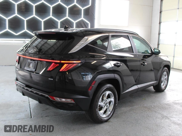 2022 Hyundai Tucson SEL with VIN 5NMJBCAE5NH030189, listed as a Copart auction lot 56405965 with 33,864 mi miles and Salvage Title. Bid and sale history available at DreamBid. Image 3.