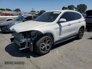 2017 BMW X1 xDrive28i with VIN WBXHT3C3XH5F86423, listed as a Copart auction lot 61421355 with 49,819 mi miles and Salvage title. Bid and sale history available at DreamBid. Image 1.