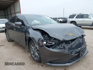 2020 Mazda 6 Sport with VIN JM1GL1UM3L1523858, listed as a IAAI auction lot 41506321 with 49,102 mi miles and . Bid and sale history available at DreamBid. Image 1.