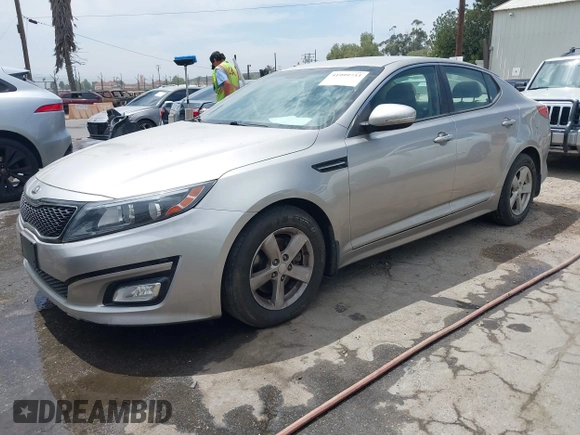 2014 Kia Optima LX with VIN KNAGM4A74E5489032, listed as a IAAI auction lot 41999733 with 83,998 mi miles. Bid and sale history available at carsss.com. Image 2.