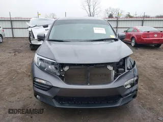 2017 Honda Pilot EX-L with VIN 5FNYF6H55HB063063, listed as a IAAI auction lot 41491193 with 75,444 mi miles and . Bid and sale history available at DreamBid. Image 13.