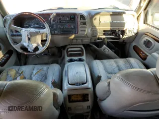 2000 Cadillac Escalade z VIN 1GYEK13R5YR107157, wystawiony jako Copart lot #89024795 z przebiegiem 172 599 mil mil oraz Szkody całkowita. Historia ofert i sprzedaży dostępna na DreamBid. Obrazek 8.
