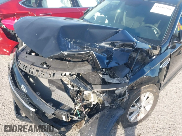 2016 Kia Optima LX with VIN 5XXGT4L31GG022844, listed as a IAAI auction lot 41240100 with 121,586 mi miles and . Bid and sale history available at DreamBid. Image 6.