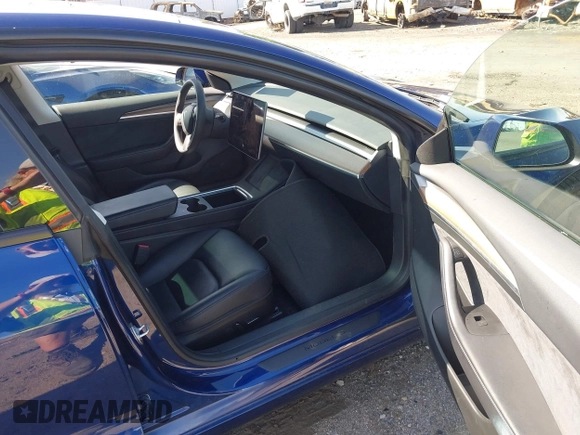2023 Tesla Model 3 Long Range with VIN 5YJ3E1EB0PF620745, listed as a IAAI auction lot 42010603 with 39,846 mi miles and . Bid and sale history available at DreamBid. Image 5.