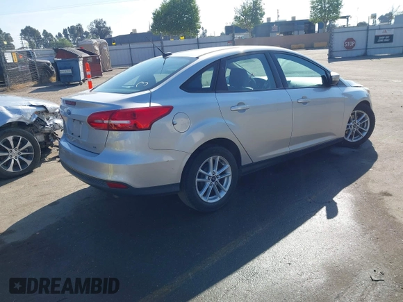 2016 Ford Focus SE with VIN 1FADP3F24GL230601, listed as a IAAI auction lot 41988130 with 176,366 mi miles. Bid and sale history available at carsss.com. Image 4.