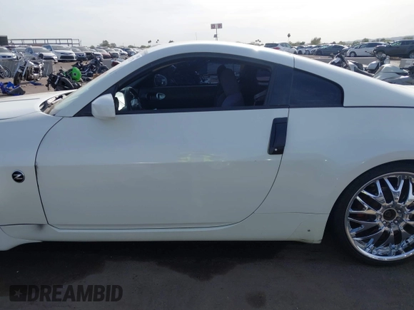 2004 Nissan 350Z Touring with VIN JN1AZ34D14M102966, listed as a IAAI auction lot 41921270 with 182,633 mi miles. Bid and sale history available at carsss.com. Image 15.