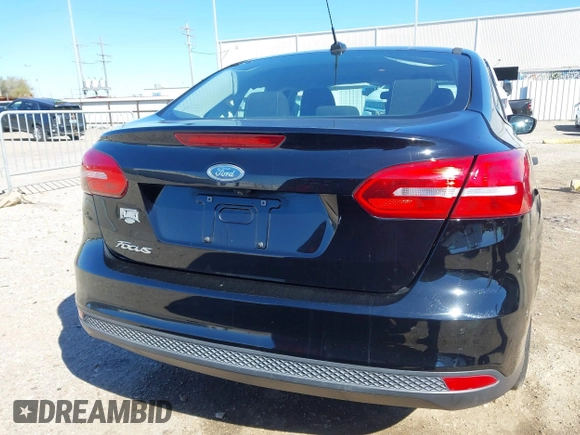 2018 Ford Focus S with VIN 1FADP3E29JL259004, listed as a IAAI auction lot 41841485 with 77,567 mi miles. Bid and sale history available at carsss.com. Image 16.