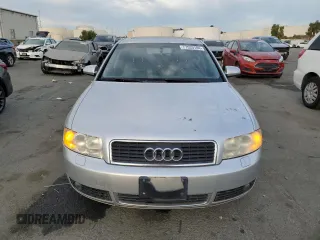 2005 Audi A4 1.8T with VIN WAUJC68EX5A065001, listed as a Copart auction lot 77533784 with 128,124 mi miles and Salvage Title. Bid and sale history available at carsss.com. Image 5.