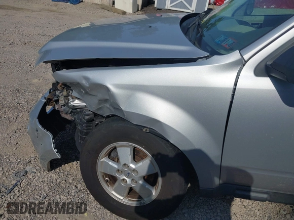 2012 Ford Escape XLS z VIN 1FMCU0C75CKB76265, wystawiony jako IAAI lot #42578815 z przebiegiem 97 423 mil mil oraz . Historia ofert i sprzedaży dostępna na DreamBid. Obrazek 6.