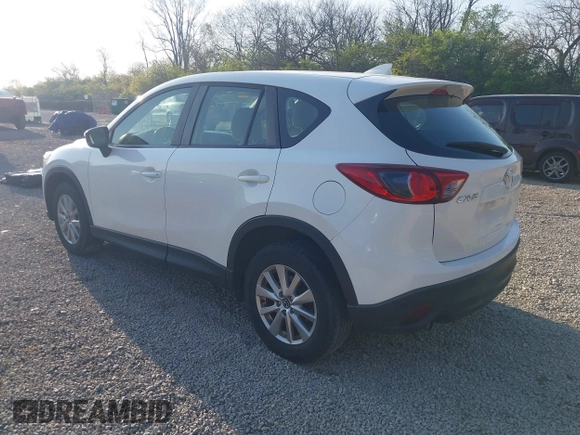 2016 Mazda CX-5 Sport with VIN JM3KE2BY2G0819604, listed as a IAAI auction lot 42059846 with 124,911 mi miles. Bid and sale history available at carsss.com. Image 3.