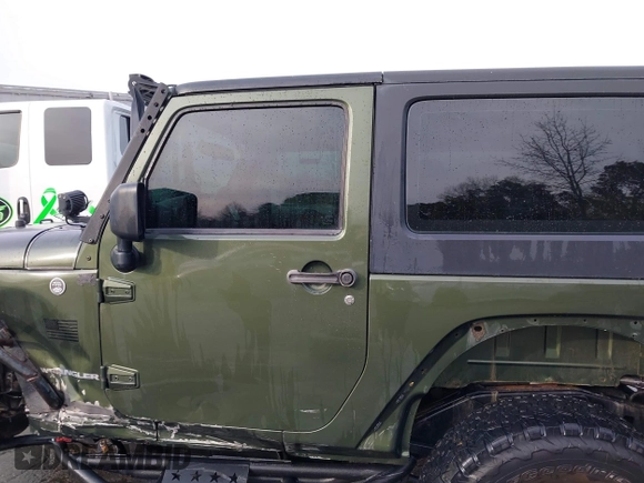 2009 Jeep Wrangler Rubicon z VIN 1J8GA64169L743008, wystawiony jako IAAI lot #41792451 z przebiegiem 142 414 mil mil oraz . Historia ofert i sprzedaży dostępna na DreamBid. Obrazek 14.