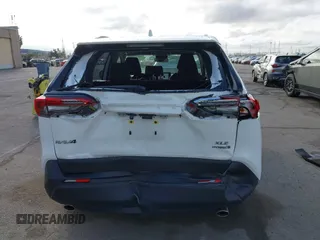 2023 Toyota RAV4 Hybrid XLE with VIN JTMRWRFV3PD205098, listed as a IAAI auction lot 41845095 with 22,908 mi miles. Bid and sale history available at carsss.com. Image 16.