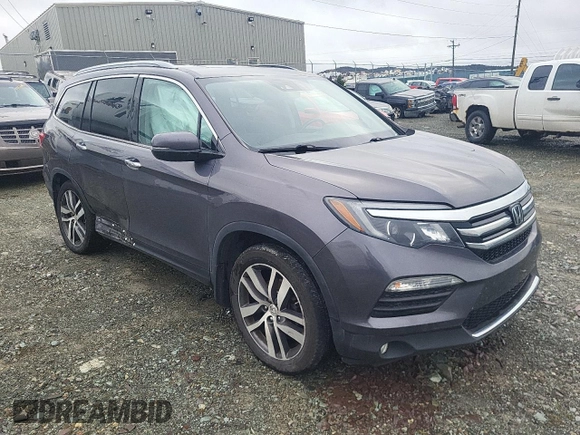 2018 Honda Pilot Touring z VIN 5FNYF6H93JB500695, wystawiony jako Copart lot #83302284 z przebiegiem 12 086 mil mil oraz Szkoda całkowita • Salvage title. Historia ofert i sprzedaży dostępna na DreamBid. Obrazek 4.