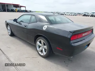 2012 Dodge Challenger SXT Plus z VIN 2C3CDYAG2CH281069, wystawiony jako IAAI lot #42314949 z przebiegiem 167 592 mil mil oraz . Historia ofert i sprzedaży dostępna na DreamBid. Obrazek 3.