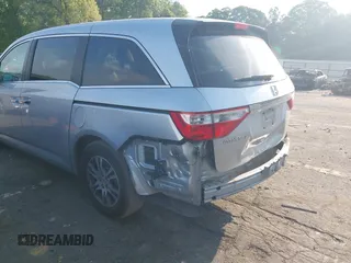 2013 Honda Odyssey EX-L with VIN 5FNRL5H6XDB084016, listed as a IAAI auction lot 42044300 with 156,296 mi miles and . Bid and sale history available at carsss.com. Image 17.