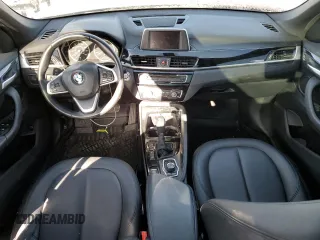 2016 BMW X1 xDrive28i z VIN WBXHT3C35G5E50005, wystawiony jako Copart lot #74476533 z przebiegiem 128 031 mil mil oraz Szkoda całkowita • Salvage title. Historia ofert i sprzedaży dostępna na DreamBid. Obrazek 8.