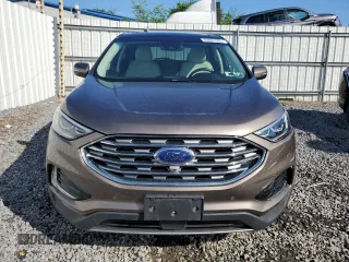 2019 Ford Edge Titanium with VIN 2FMPK4K99KBC31259, listed as a Copart auction lot 63067555 with 86,629 mi miles and Salvage title. Bid and sale history available at DreamBid. Image 5.